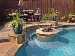 Fire Pit inside Pool with Bench in Frisco