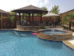 Iridescent Tile on Spa with Tiered Spillway and Swim Up Bar in Plano