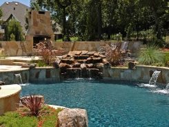 Raised Bond Beam with Waterfall and Stone Scuppers (1)