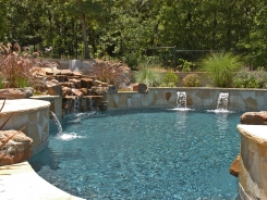 Raised Bond Beam with Waterfall and Stone Scuppers