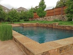 Glass Tile Spa, Brass Spillways with Ocean Blue Pebble Sheen in Allen