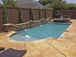 Iridescent Glass Tile Spa, Aqua Blue Pebble Sheen, Stone Scuppers and Bubbler in Frisco