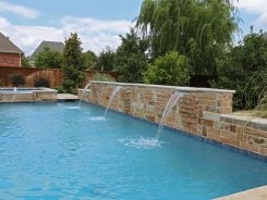 Raised Bond Beam with Stone Scuppers