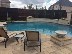 Water Bowls on Raised Bond Beam with Aqua Blue Pebble Sheen in Frisco