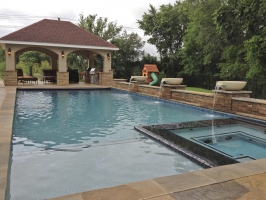 iridescent-glass-tile-spa-with-aqua-blue-pebble-sheen-and-stucco-pavilion-in-friscoiridescent-glass-tile-spa-with-ocean-blue-pebble-sheen-and-stucco-pavilion-in-frisco-2