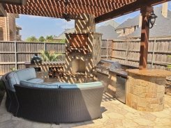 Cedar Arbor, BBQ Island with Chocolate Lueders and Belgard Pavers in Frisco