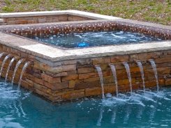 Glass Tile Spa, Brass Spillways with Ocean Blue Pebble Sheen in Allen