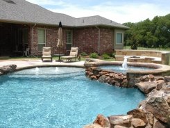 Tile on Spa with Waterfall Spillway and Fire Pit in Lucas