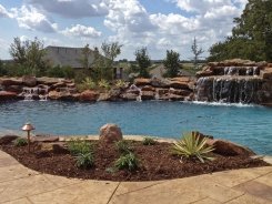 Stone Grotto and Waterfalls with Ocean Blue Pebble Sheen in Prosper (1)