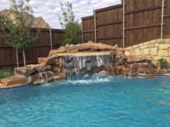 Stone Grotto with Aqua Blue Pebble Sheen in Frisco