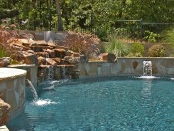 Stone Waterfall with Stone Scuppers on Raised Bond Beam